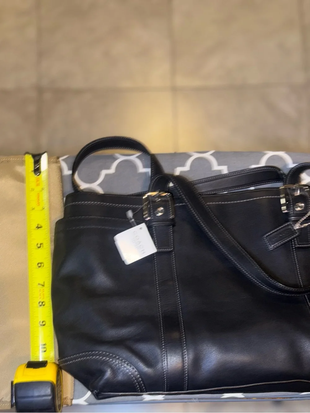 Coach sleek black